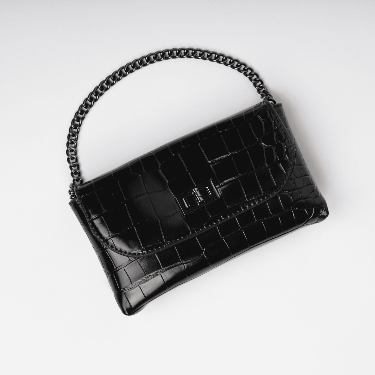 Black faux leather handbag